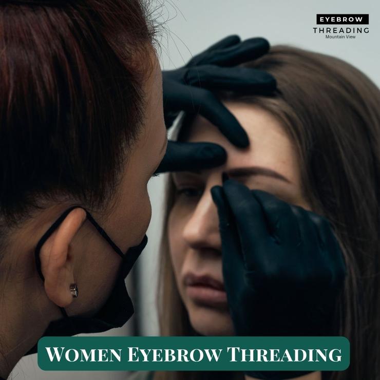 women eyebrow threading
